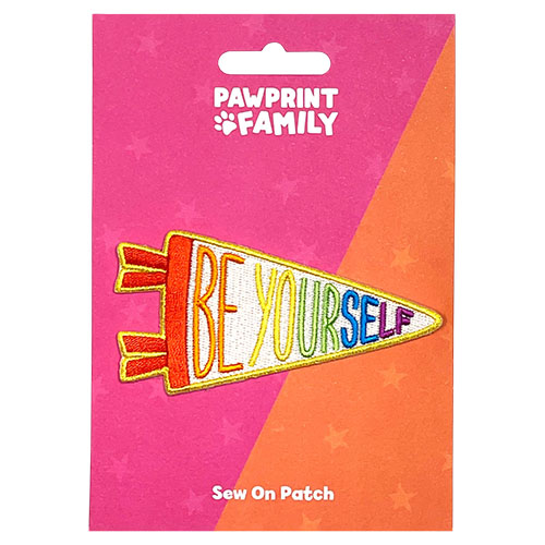 Rainbow coloured Be Yourself pennant patch on a pink and orange backing card Pawprint Family Whirligig Toys