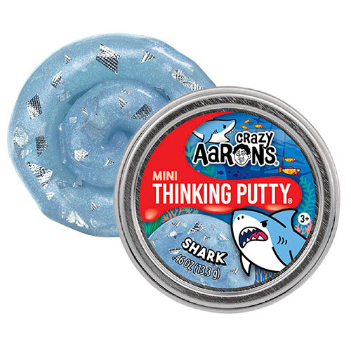 Crazy Aaron's Mini Thinking Putty in a shark design container on a white background Whirligig Toys