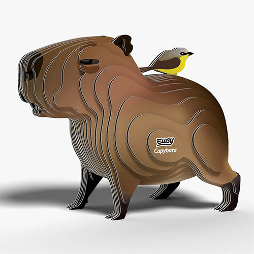 Capybara-shaped model with a bird on its back on a white background