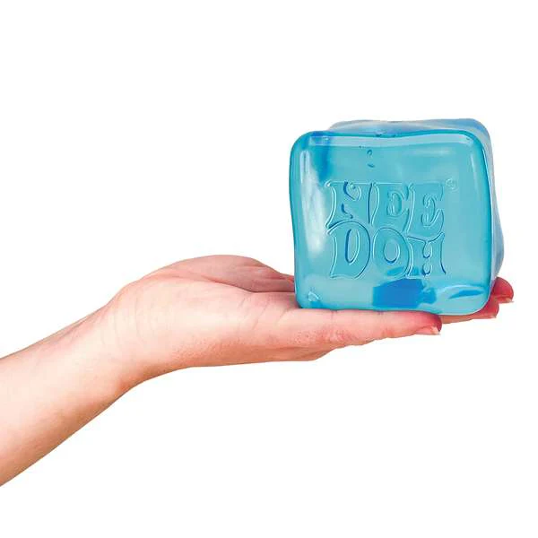Hand holding a Blue Needoh Nice Berg on a white background Schylling Whirligig Tous 