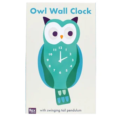 Owl wall clock with swinging tail pendulum on a white background